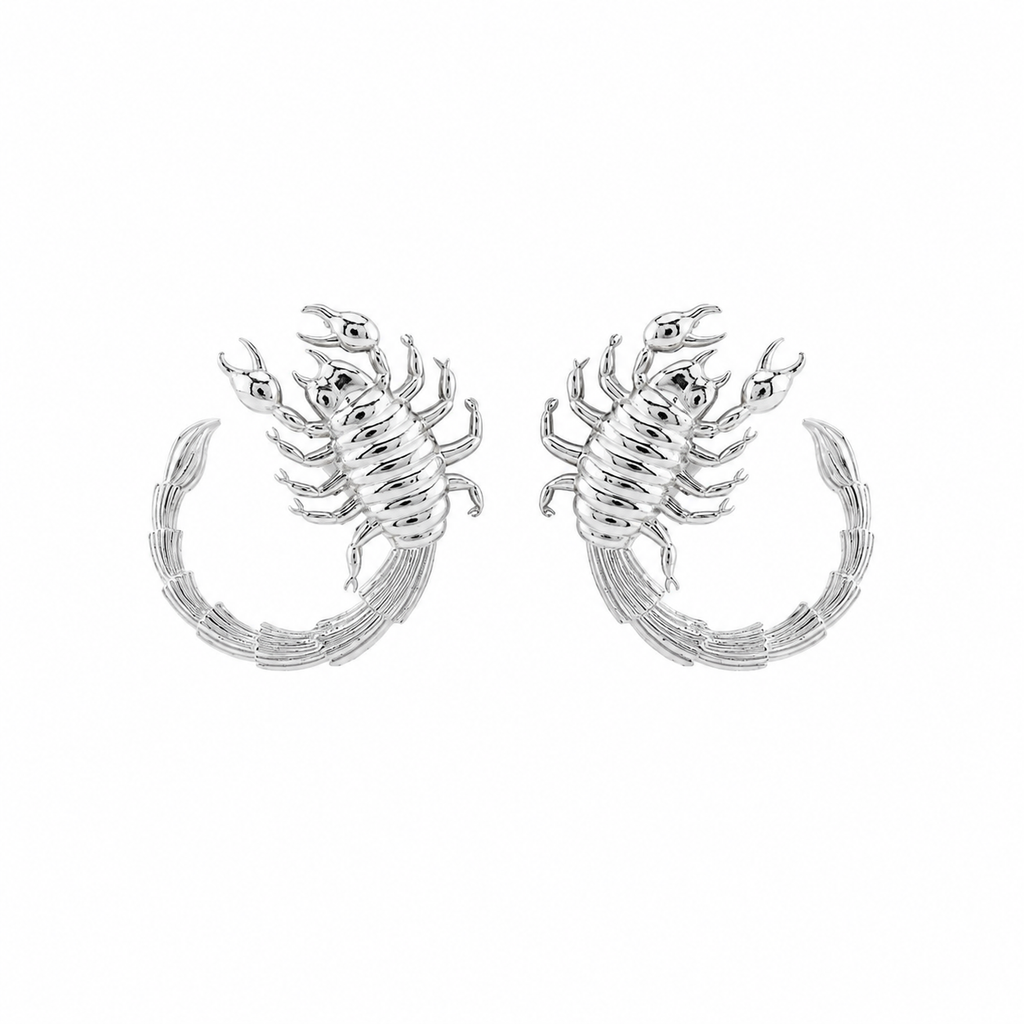 Silver scorpion-shaped hoop earrings on a white background
